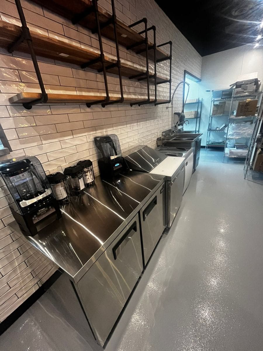 Back bar prep station with blenders and polished stainless steel